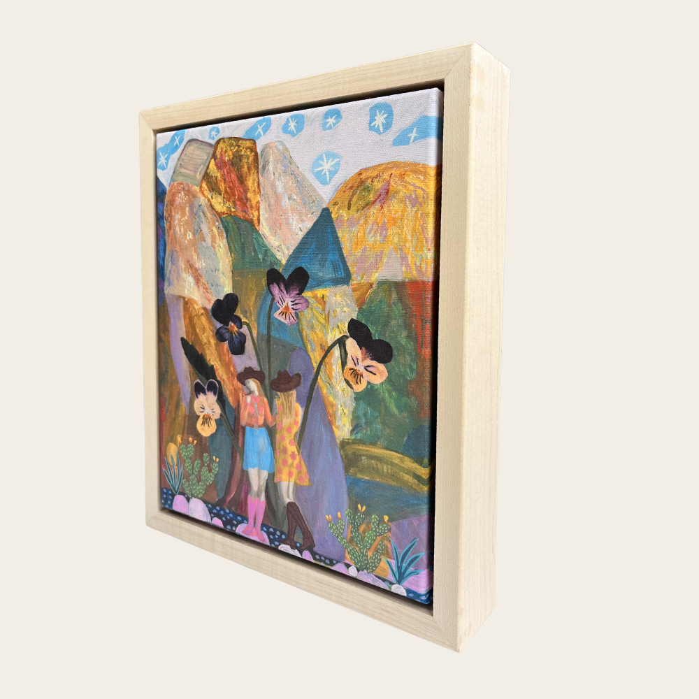 The image is a framed painting depicting a colorful, whimsical scene with various elements such as flowers, people, and mountains.